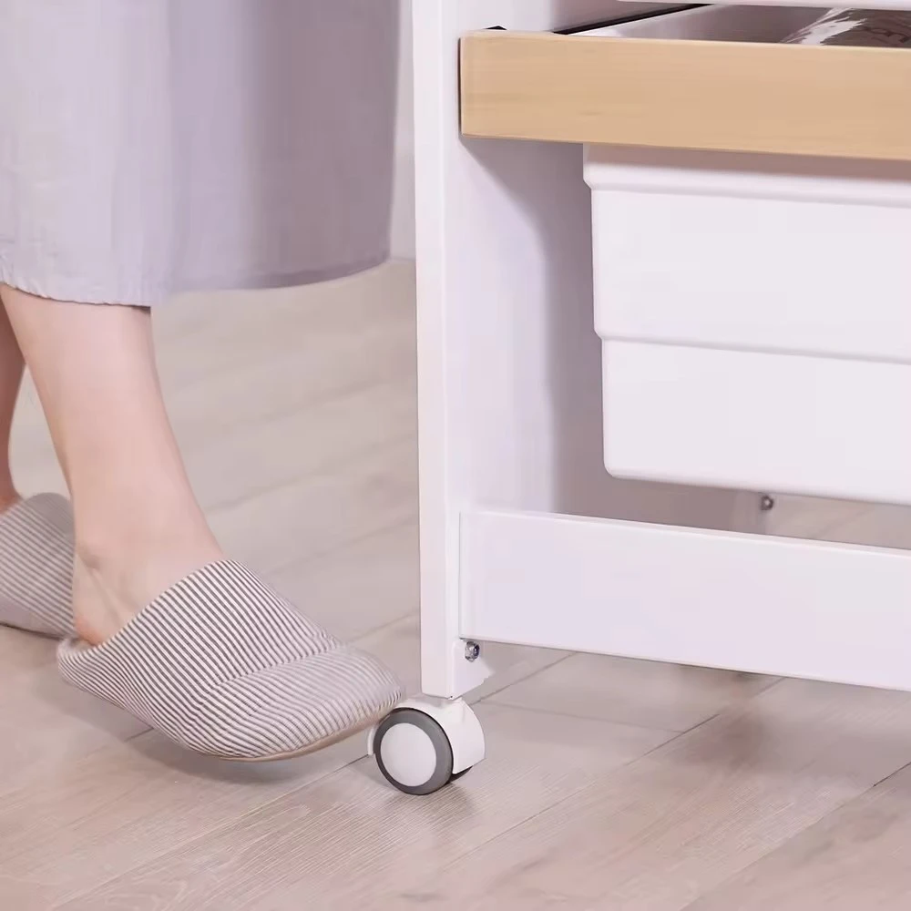 Locking caster wheel mechanism ensuring baby changing station safety during use. Locking caster wheel mechanism ensuring baby changing station safety during use.